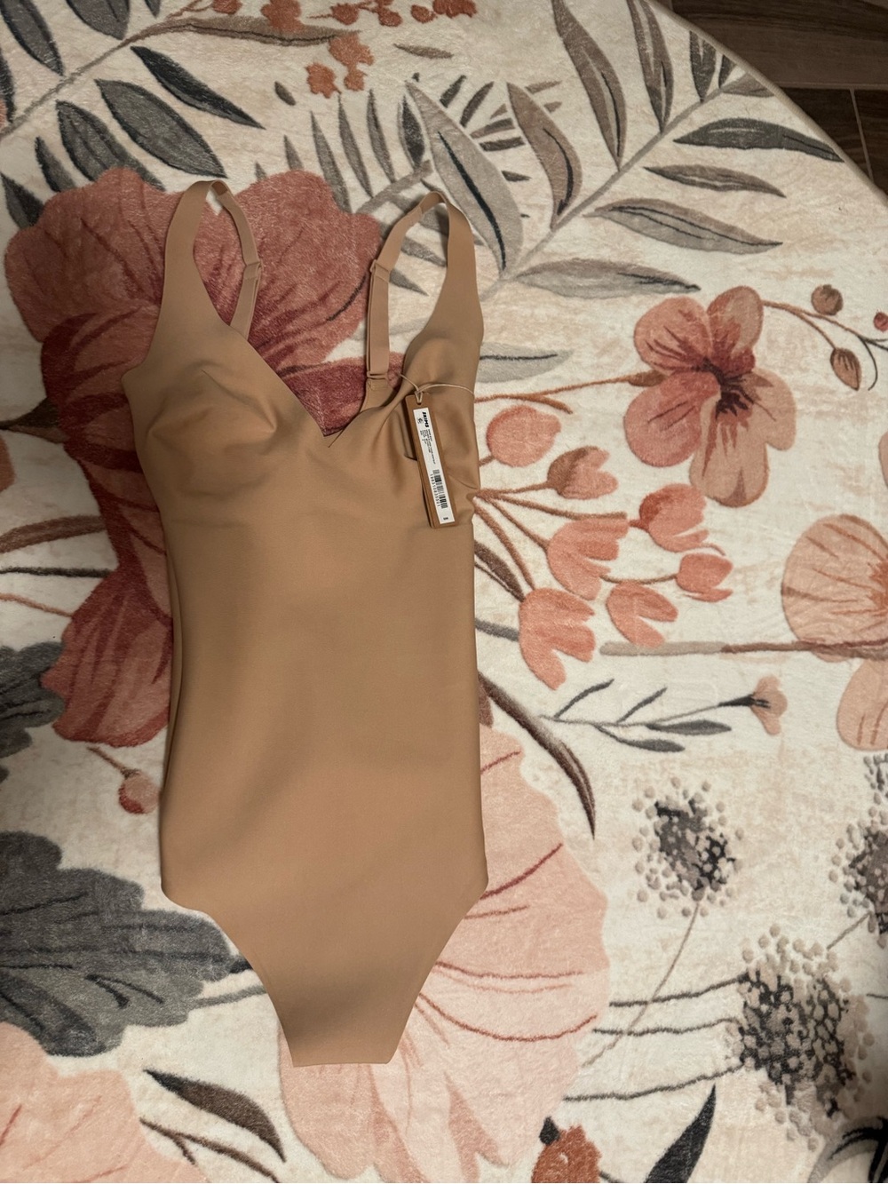 SKIMS Sculpting Seamless Bodysuit in Tan